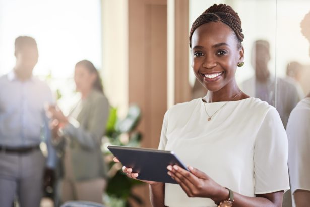 Im the owner of the most successful brand. Shot of a young businesswoman using her digital tablet.