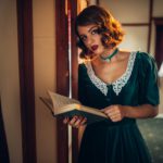Old-fashioned woman travels, retro train
